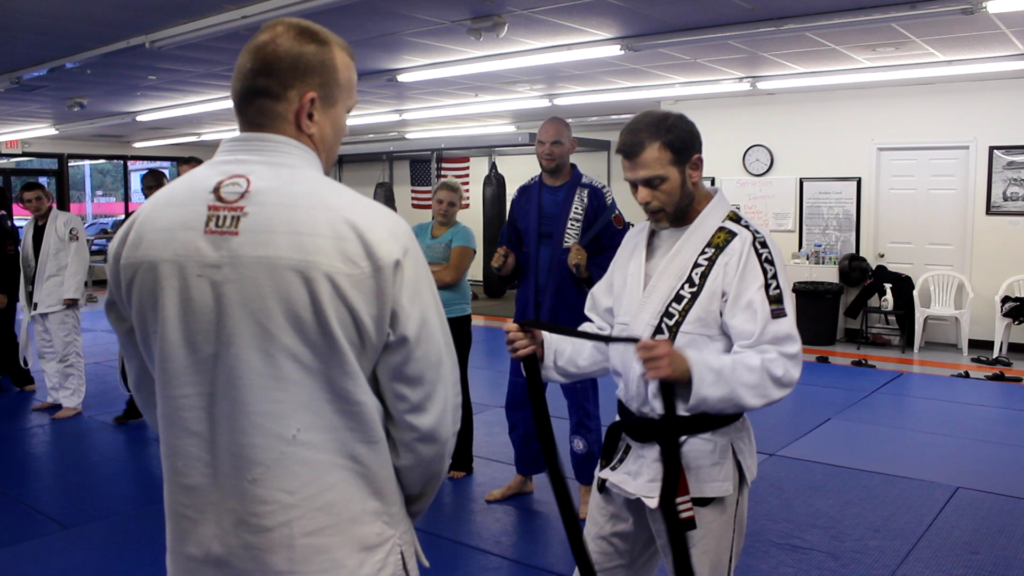 Texarkana Jiu Jitsu's Marc Hagebusch promoting Billy Mullino to Black Belt.